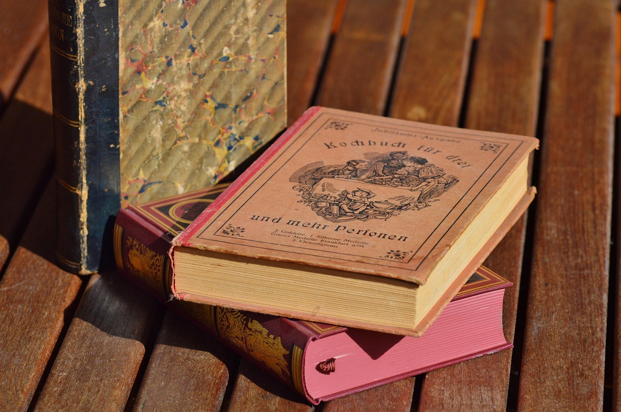 books, old books, old cooking books, cooking books, book stack, old german script, antiquarian, historical, old, spine, used books, lying, paper, worn, read